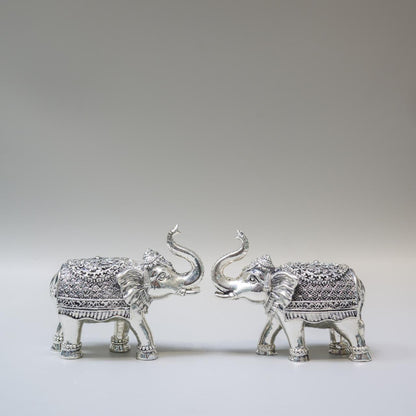 Silver Elephant Pair Showpiece – Handcrafted Trunk-Up Elephant Statues with Ornate Detailing | Vastu Décor & Housewarming Gift